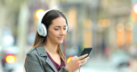 Listenng with headphones - girl.